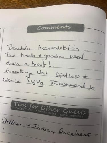 a page of a book with handwriting on it at Stravaig in Innerleithen