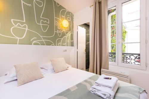 Posteľ alebo postele v izbe v ubytovaní House with terrasse - 3BR-8P - Sacré Coeur