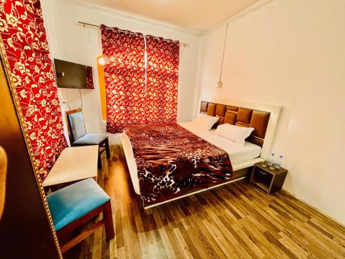 Postel nebo postele na pokoji v ubytování Hotel Sani