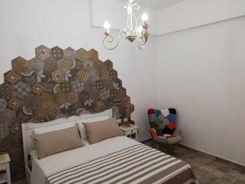 Postel nebo postele na pokoji v ubytování B&B Notte d'autore