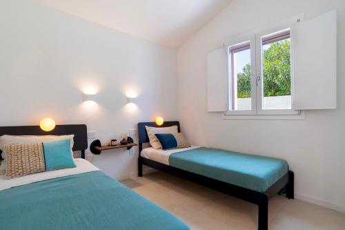 Ένα ή περισσότερα κρεβάτια σε δωμάτιο στο CASA MOROS 6, Emma Villas