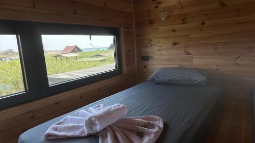 Postel nebo postele na pokoji v ubytování Era Cottage