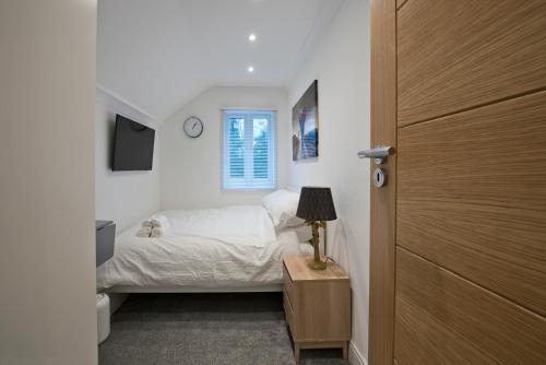 Ένα ή περισσότερα κρεβάτια σε δωμάτιο στο Newly refurbished house