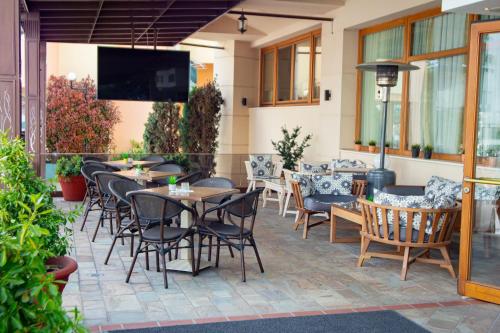 TV a/nebo společenská místnost v ubytování Elena Hotel