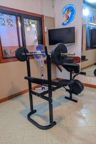 a room with a gym with a fan at LE NOUVEL EDEN in Toliara