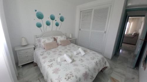 Posteľ alebo postele v izbe v ubytovaní La Casa Azul