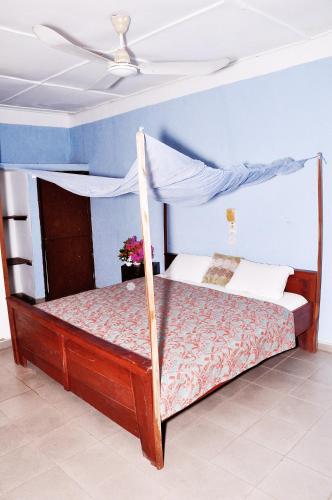 Llit o llits en una habitació de Hôtel Bellevue