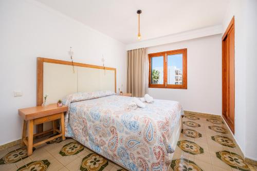 Katil atau katil-katil dalam bilik di Apartamento Felipe 1-5