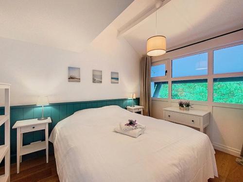 Ένα ή περισσότερα κρεβάτια σε δωμάτιο στο Maison Westenzoo