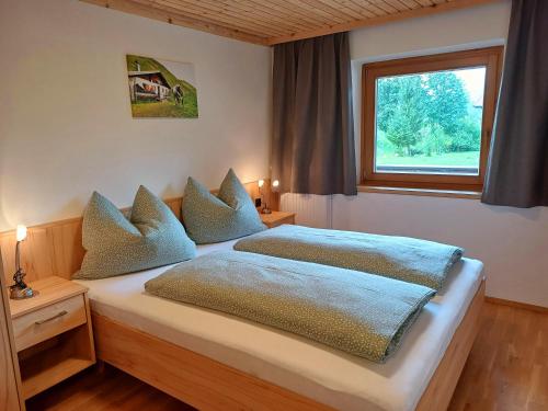 Postel nebo postele na pokoji v ubytování Frandlhof