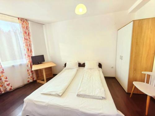 Postel nebo postele na pokoji v ubytování Family Apartments in Solmarin