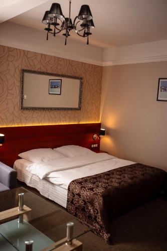 Hotel&Spa Kameleonにあるベッド