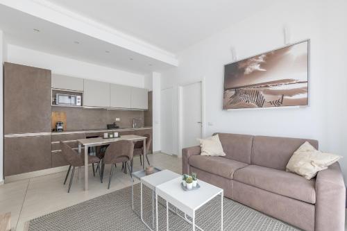 a living room with a couch and a table at Via Santa Croce 1 in Milan