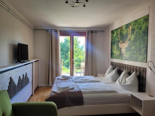 Postel nebo postele na pokoji v ubytování Jaeger Guesthouse
