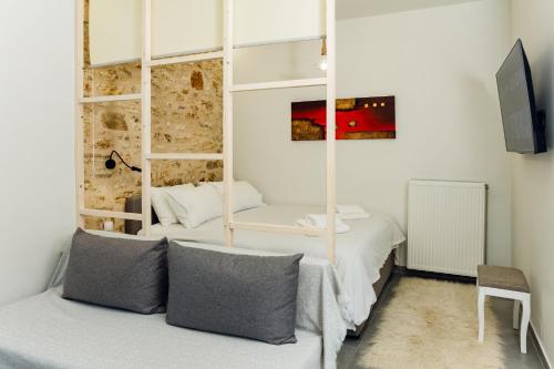 TV a/nebo společenská místnost v ubytování Top Alti Studio Apartment