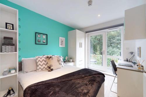 Postel nebo postele na pokoji v ubytování Stepney Yard in Newcastle