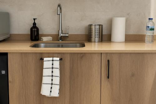Dapur atau dapur kecil di Rua Mayor MSuites