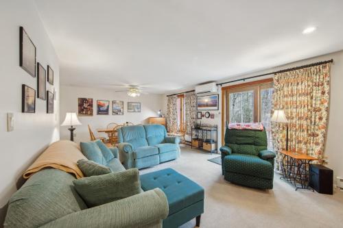 a living room with a couch and two chairs at Chatiemac 42F - Quiet & Cozy 3-Bedroom Retreat in North Creek
