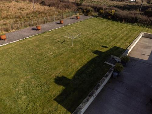 an overhead view of a large shadow on a field at Loch View House in Loch Gowna in Lough Gowna