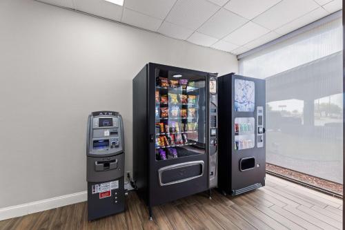 two vending machines are next to each other at Americas Best Value Inn Fort Worth/Hurst in Richland Hills