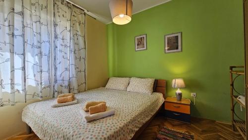 En eller flere senge i et værelse på Sea View Danijela 2-4 pax