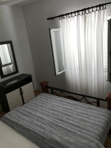Una cama o camas en una habitación de Apartment K2
