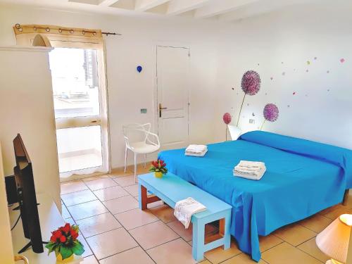 TV a/nebo společenská místnost v ubytování B&B Casa De Mare