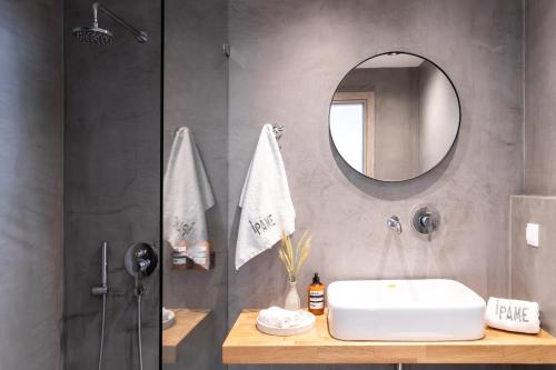 a bathroom with a sink and a mirror at PAME House in Athens