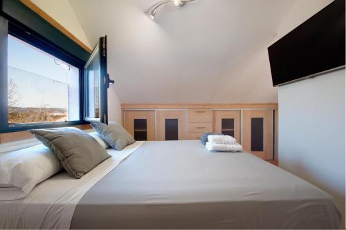 Ένα ή περισσότερα κρεβάτια σε δωμάτιο στο Casa de Descanso by Vintage Travel