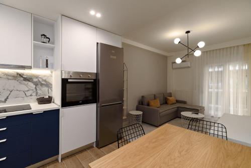 Kuchyň nebo kuchyňský kout v ubytování Blu & Marrone Suites-parking included