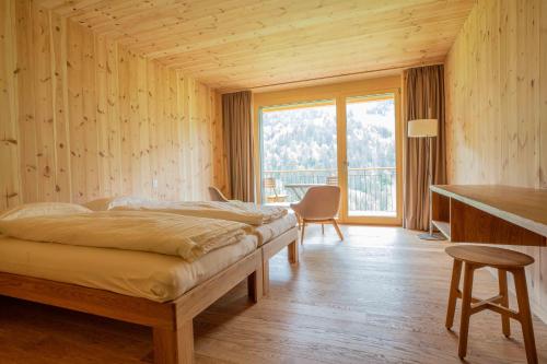 Postel nebo postele na pokoji v ubytování ChieneHuus - vegetarisches Hotel und Seminarhaus