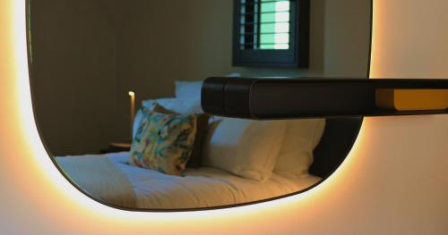 Ένα ή περισσότερα κρεβάτια σε δωμάτιο στο Les Villas de la Ville d'Hiver Palissy et Velleda