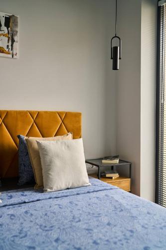 Ένα ή περισσότερα κρεβάτια σε δωμάτιο στο Scandinavian Stay - Awarded Bldg - Downtown