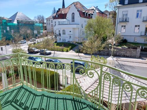 a view of a city from a balcony at Villa Lindenhof in Bad Elster