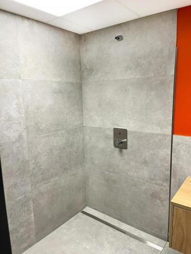 a corner of a shower in a room at Erlebniswelt Resort Apartment 4 in Reken