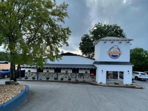 a building with a sign on the side of it at The Perch at Kimberling Crossing in Kimberling City