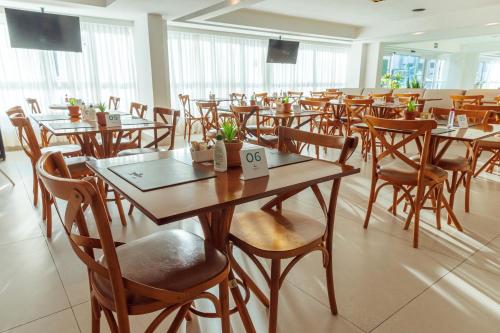 Restoran atau tempat lain untuk makan di Hotel Village Confort