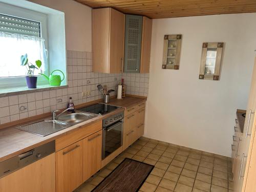Kuchyň nebo kuchyňský kout v ubytování Gästezimmer Mia