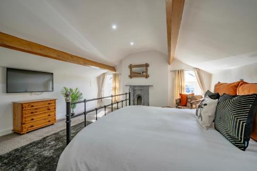 Postel nebo postele na pokoji v ubytování Casbah Coffee Club Suites