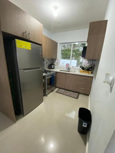 Kuchyň nebo kuchyňský kout v ubytování Oceanview Townhouse