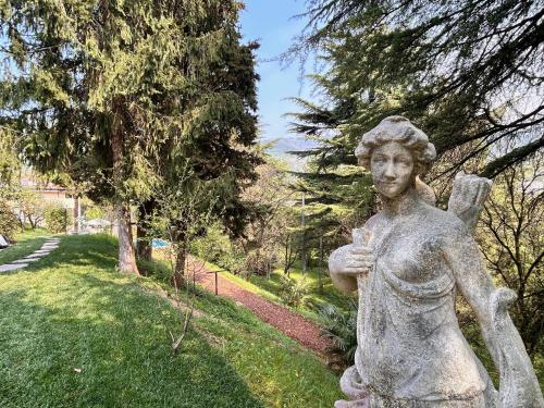 a statue of a statue of a cherub at Relais Villa Alma in Castion Veronese