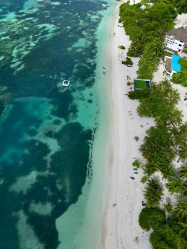 an aerial view of a beach and the ocean at FUNPLACE BEACH in Himmafushi