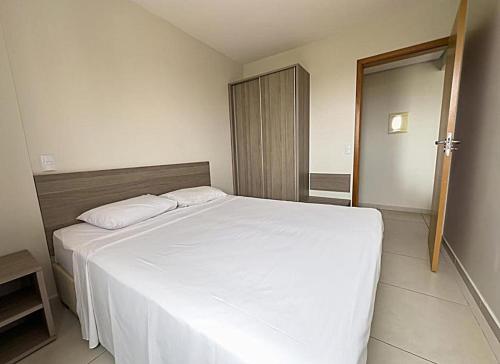Postel nebo postele na pokoji v ubytování Atrium Thermas Recidence Service