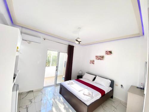 Ένα ή περισσότερα κρεβάτια σε δωμάτιο στο Apartmente Pamela