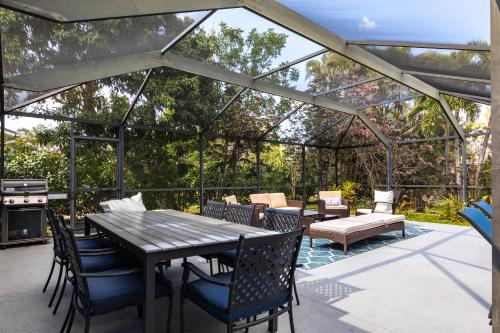 Un jardín fuera de 3BR With HUGE 2k sq ft Lanai & Seasonally Heated Pool