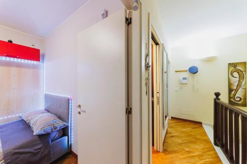 a room with a hallway with a couch and a door at Villa ElSi, Where Relaxation and Elegance Meet in Valenzano