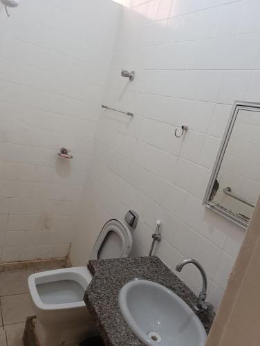 Koupelna v ubytování Casa quartos suítes