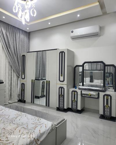 Ένα ή περισσότερα κρεβάτια σε δωμάτιο στο ASR Villa