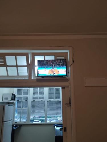 Televisyen dan/atau pusat hiburan di Lofts de luxo no Palácio Quitandinha