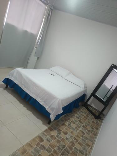 Postel nebo postele na pokoji v ubytování Apartahotel completo